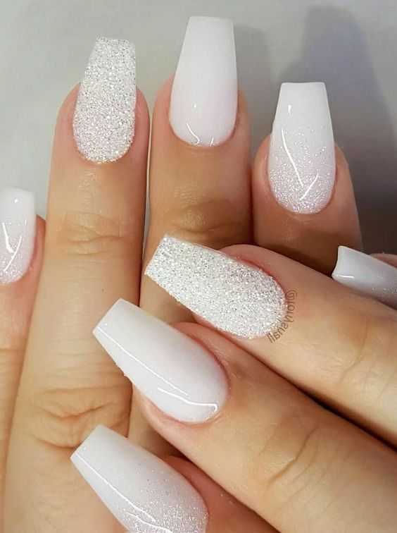 Chic Glossy White and Glitter Nail Design with Textured Contrast.