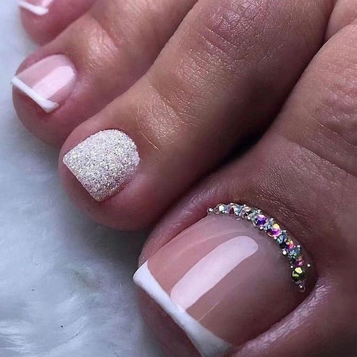 Chic Pink and White Pedicure with Glitter and Rhinestones