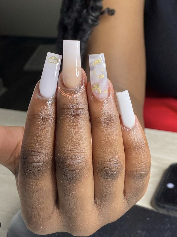 Sophisticated Pastel and Neutral French Tip Nail Design with Subtle Accent Patterns