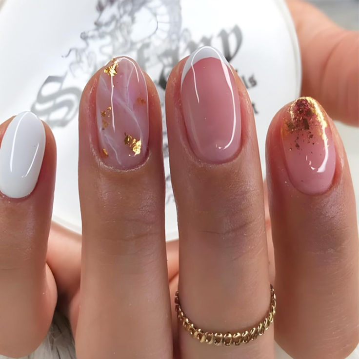 Chic Elegant Nail Design with Glossy White, Soft Pink, Gold Flakes, and Marbled Effect.