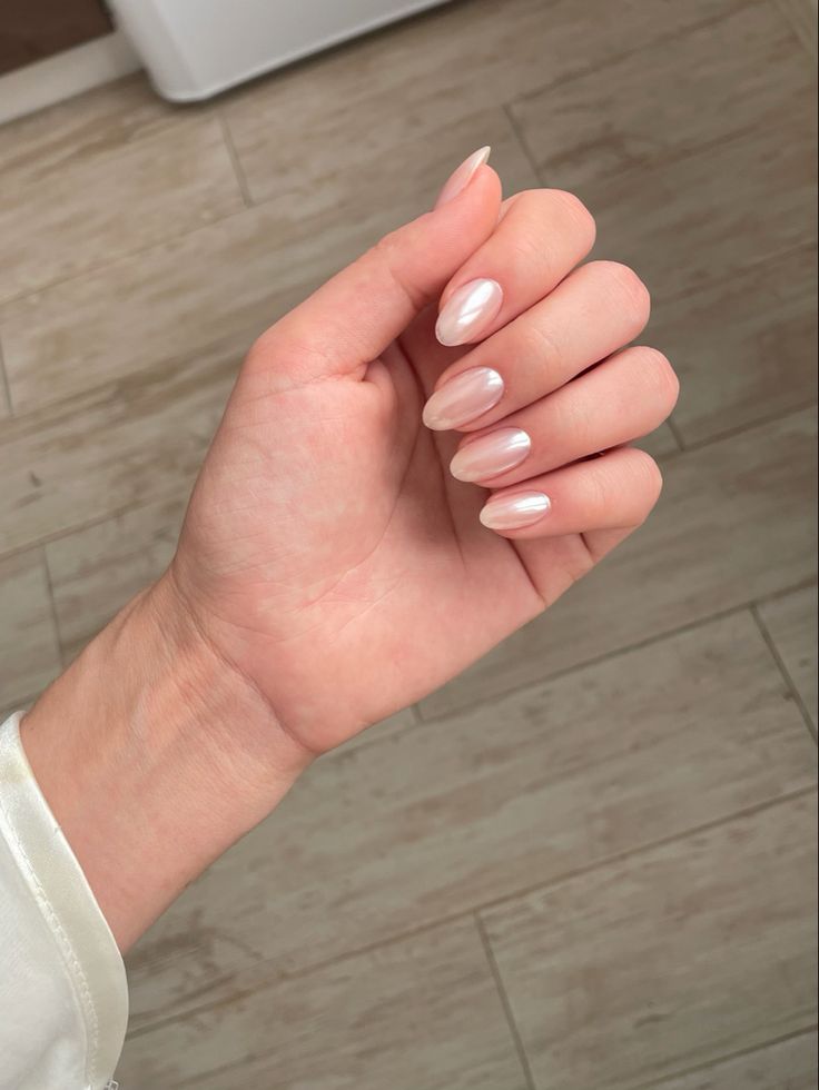 Sophisticated Almond-Shaped Nail Design with Pearlescent Finish