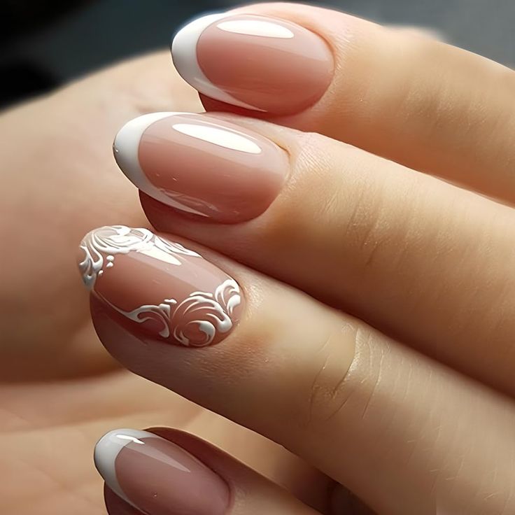 Chic French Manicure with Floral Accents for a Sophisticated Look.