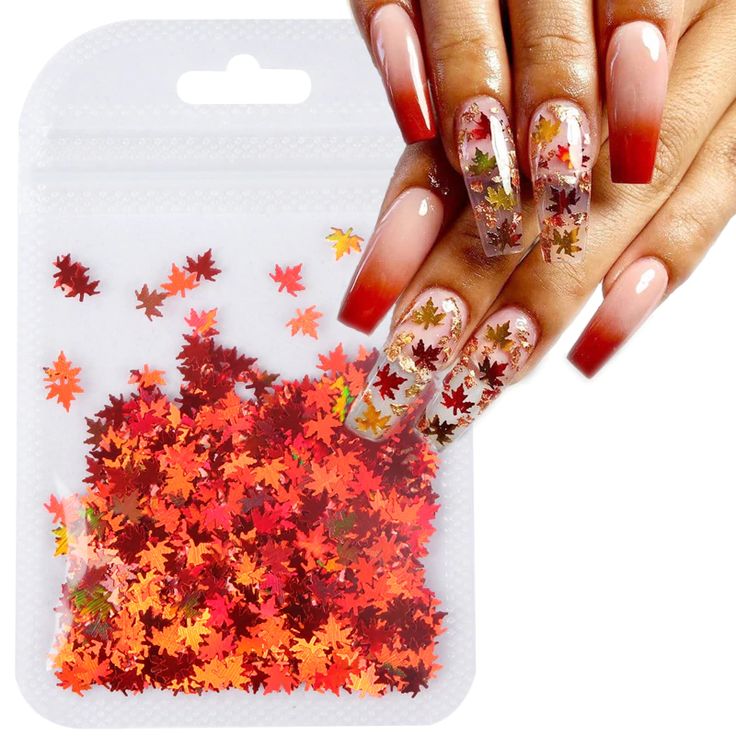 Stunning Autumn-Inspired Gradient Nail Design with Leaf Embellishments