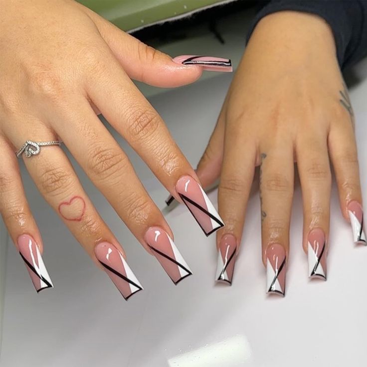 Chic Diagonal Long Nails with Soft Pink and Bold Black Accents