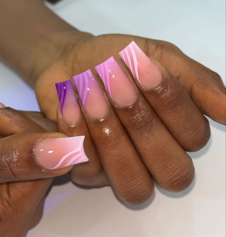 Chic Gradient Pink and Purple Long Nail Design with Elegant Swirls.