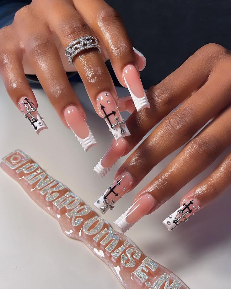 Sophisticated Nail Design with Long Shaped Nails, Soft Pink Base, and Unique White Ruffled Tips.