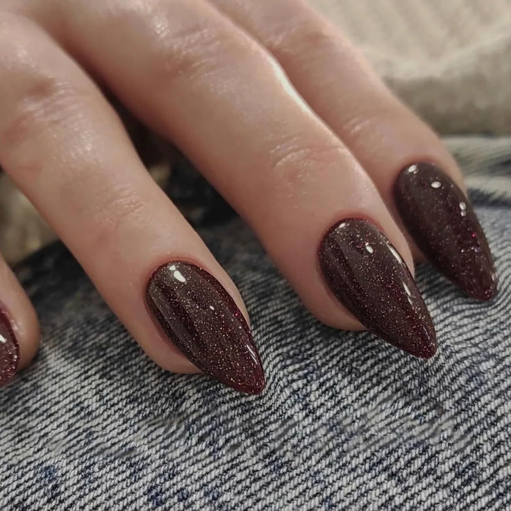 Elegant Burgundy Glitter Nails for a Striking Evening Look.