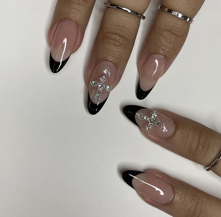 Elegant French Tip Nail Design with Modern Black Contrast and Rhinestone Accents.