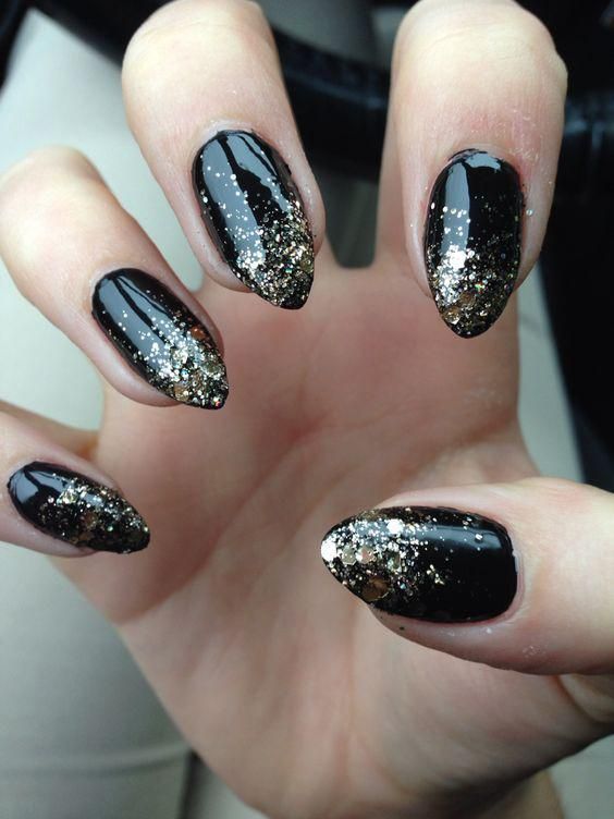 Sophisticated Black and Gold Glitter Ombre Nail Design