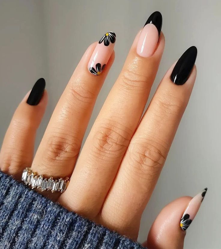 Chic Black and Nude Nail Design with Floral Patterns for Every Occasion.