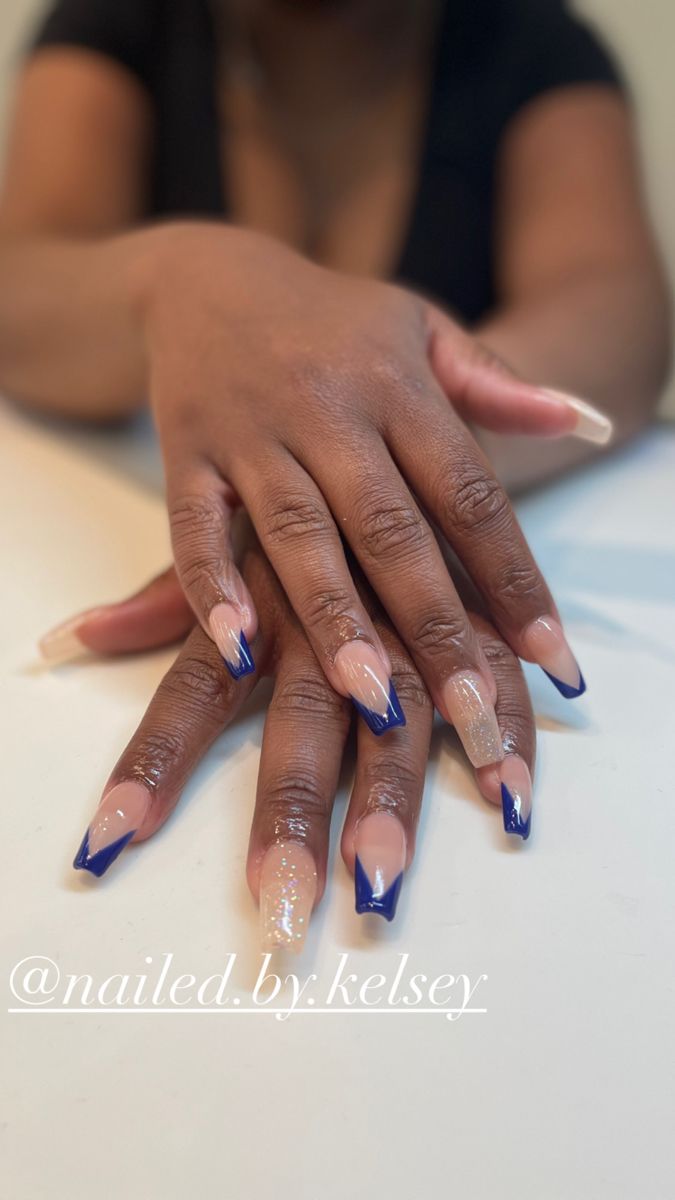 Chic Nude and Navy Blue Nail Design with Sparkling Accents