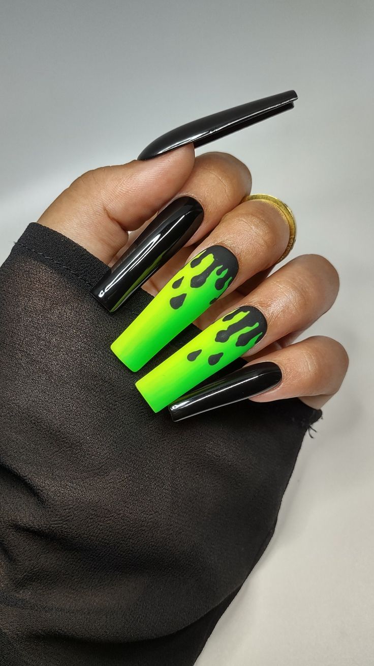 Bold Neon Green and Glossy Black Gradient Nail Design with Edgy Dripping Accents.