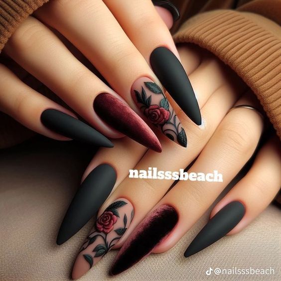 Sophisticated Elegance: Matte Black and Deep Burgundy Nail Design with Intricate Rose Motifs.