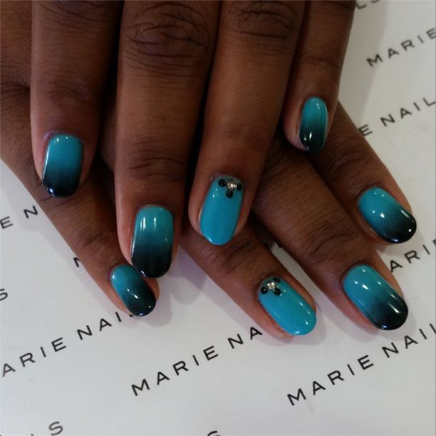 Elegant Ombre Nail Design with Turquoise and Deep Blue Gradient and Sparkling Embellishments