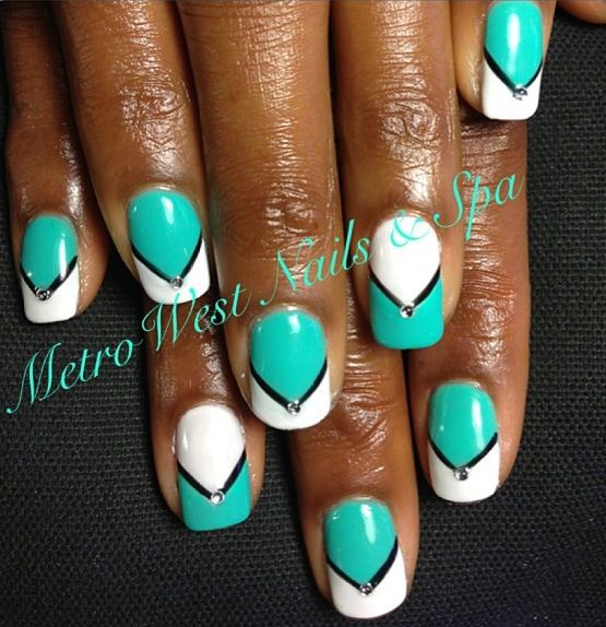 Chic Turquoise and White Geometric Nail Design with Chevron Pattern and Rhinestones.