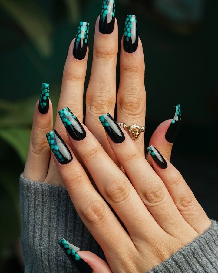 Chic Square-Tip Nail Design: Striking Black and Turquoise with Playful Dot Patterns.