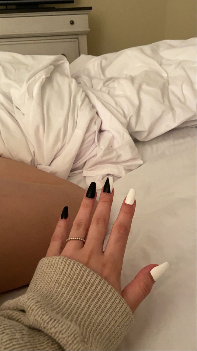 Chic Dual-Tone Black and White Nails: A Bold Statement in Edgy Elegance.