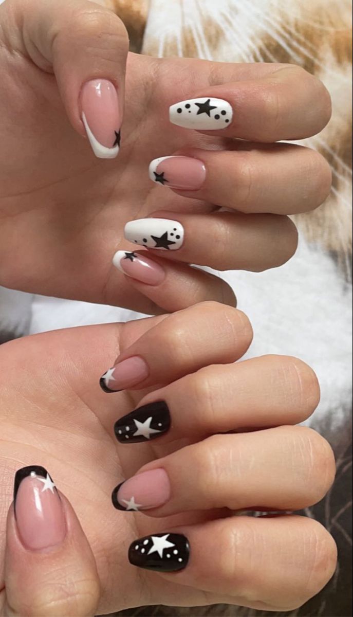 Elegant Star-Themed Nail Design Blends Classic and Playful Elements