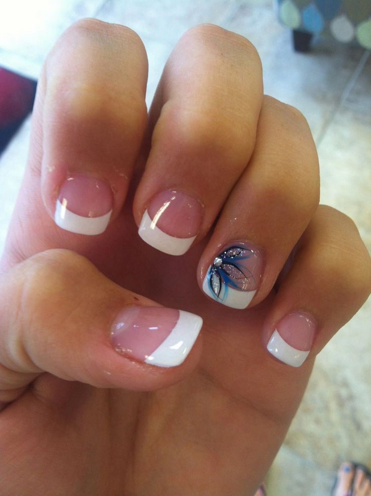 Elegant French Tip Nail Design with Charming Blue Floral Accent for Any Occasion.