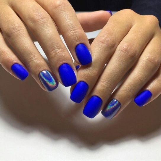 Bold Vibrant Blue Nail Design with Matte Finish and Glossy Holographic Accent.