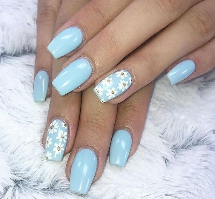 Chic Pastel Blue Nail Design with Glossy Finish and Floral Accent for a Fresh Spring Aesthetic.