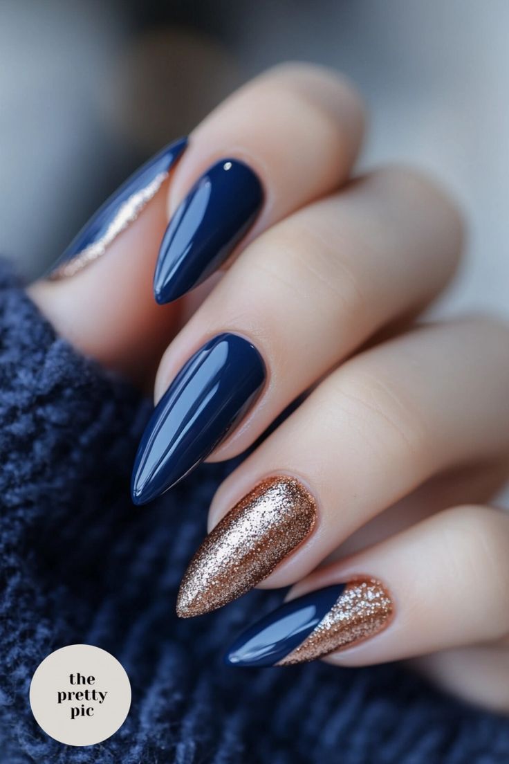 Sophisticated Deep Navy Nail Design with Shimmering Bronze Accents