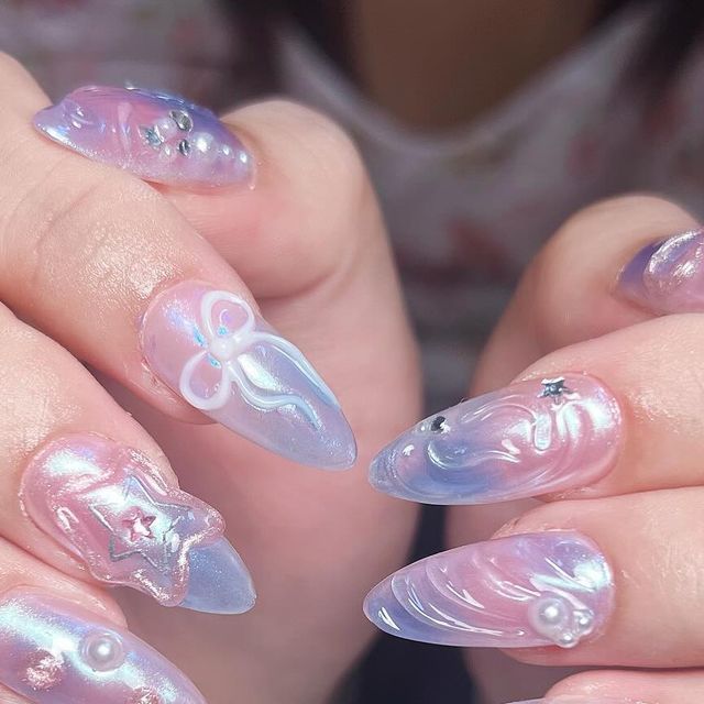 Ethereal Pastel Nail Art: A Captivating Blend of Color and Whimsy.