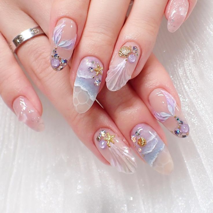 Dreamy Ocean-Inspired Pastel Nail Design with Seashells and Starfish