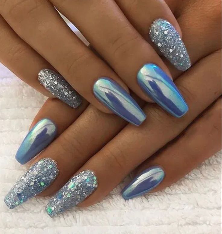 Glamorous Blue Nail Design with Glossy and Glitter Finishes in Holographic Colors.