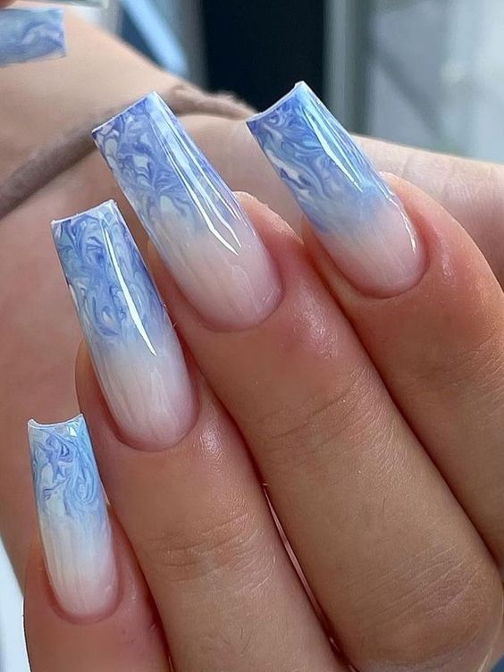 Sophisticated Ombre Nails with Marble Design and Glossy Finish.