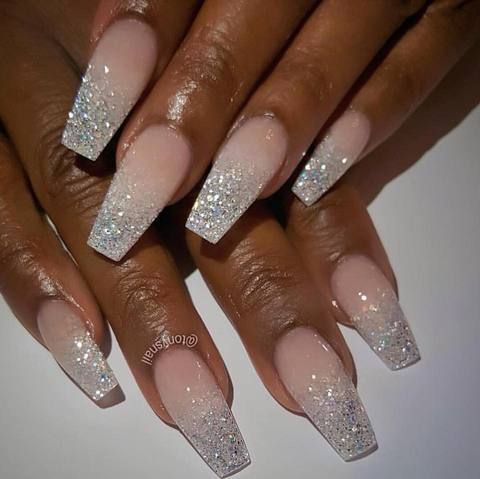 Elegant Glitter Ombre Nails: Soft Pink Base with Silver Sparkle Tips for Glamorous Looks.