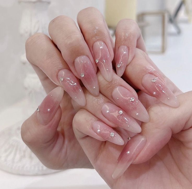 Chic Ombre Nails with Pink and Nude Gradient and Sparkling Rhinestones