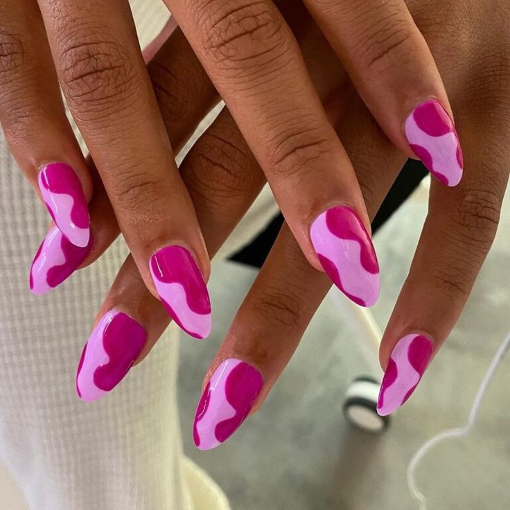 Playful Vibrant Pink and White Wavy Nail Art for a Cheerful Summery Look.