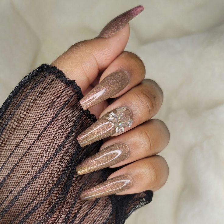 Sophisticated Elegant Nude Ombre Nails with Gem Accents for Glamorous Occasions