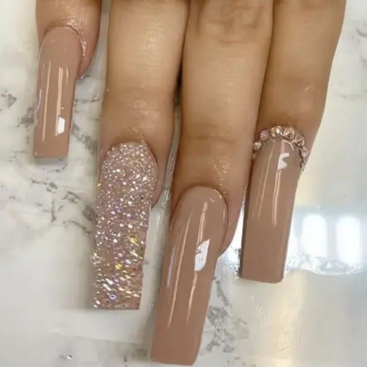 Chic Long Square Nails with Creamy Nude and Sparkling Glitter Accents.