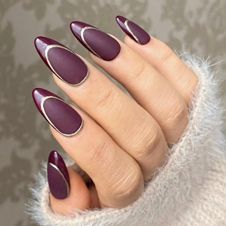 Chic Burgundy Almond Nails with Silver Accents for Versatile Elegance.