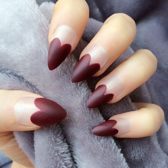 Dramatic Deep Burgundy Heart-Shaped Nail Design on Clear Base