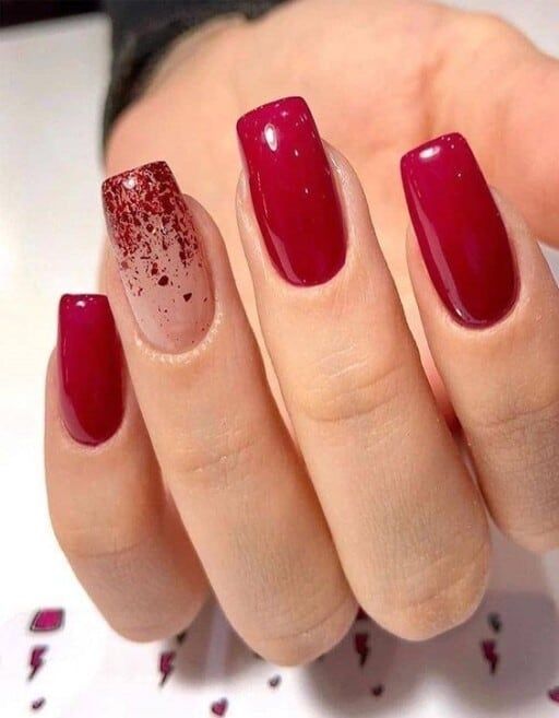 Chic Deep Red Ombre Nail Design with Glittery Accents for Any Occasion