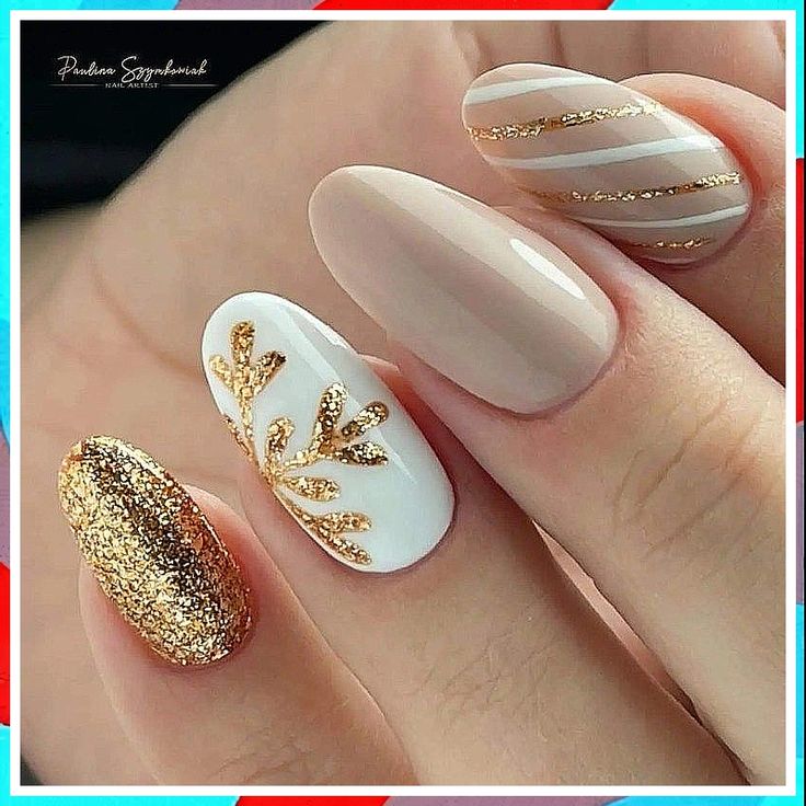 Sophisticated Nail Design: Neutral and Gold Tones with Glitter and Leaf Patterns.