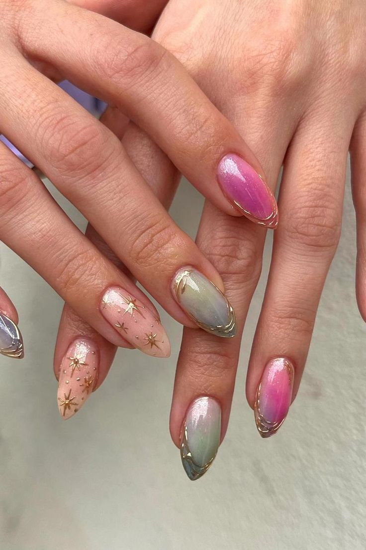 Chic Gradient Nail Design with Soft Pink, Green, Lavender Tones and Gold Accents.