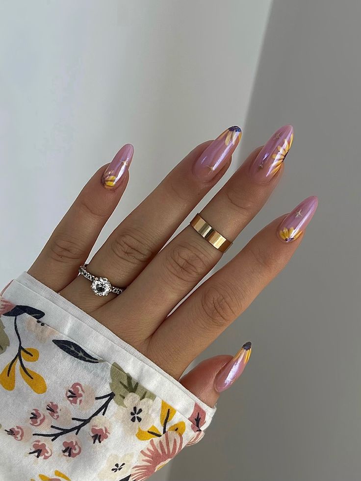 Chic Lavender Nail Design with Floral Accents and Artistic Flair.