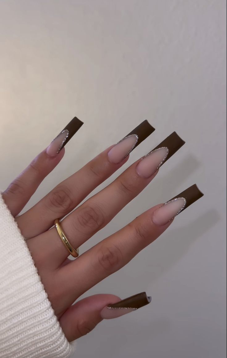 Chic Nail Design: Elegant Nude and Deep Brown with Glamorous Embellishments