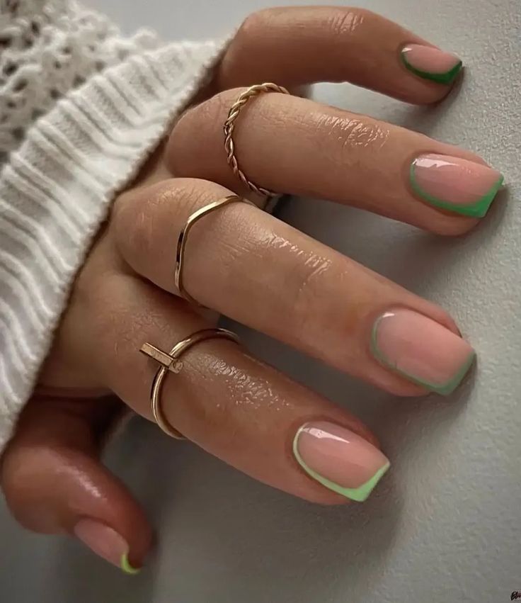 Chic Soft Pink and Green Manicure: A Modern Elegance with Delicate Accents.