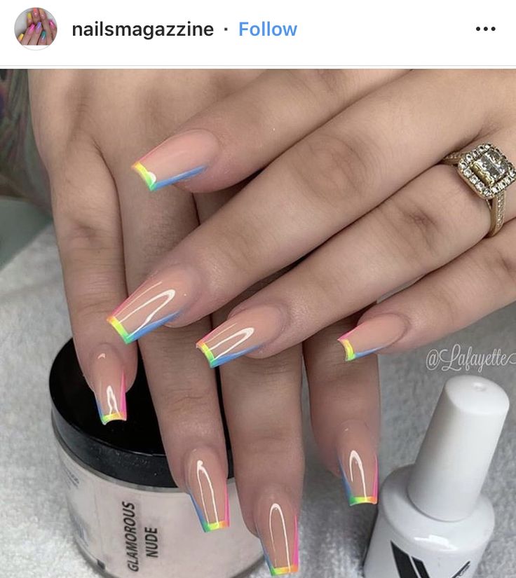 Playful Modern French Tips: Glossy Gradient Pastels on Elegantly Elongated Nails.