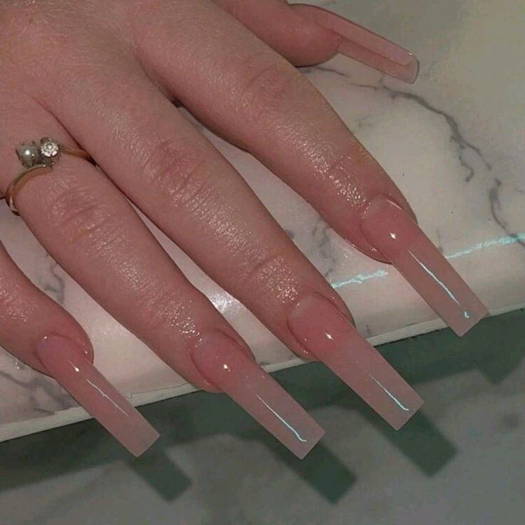 Chic Gradient Long Nails: Soft Pink Base with Glossy Clear Tips for a Sophisticated Look.