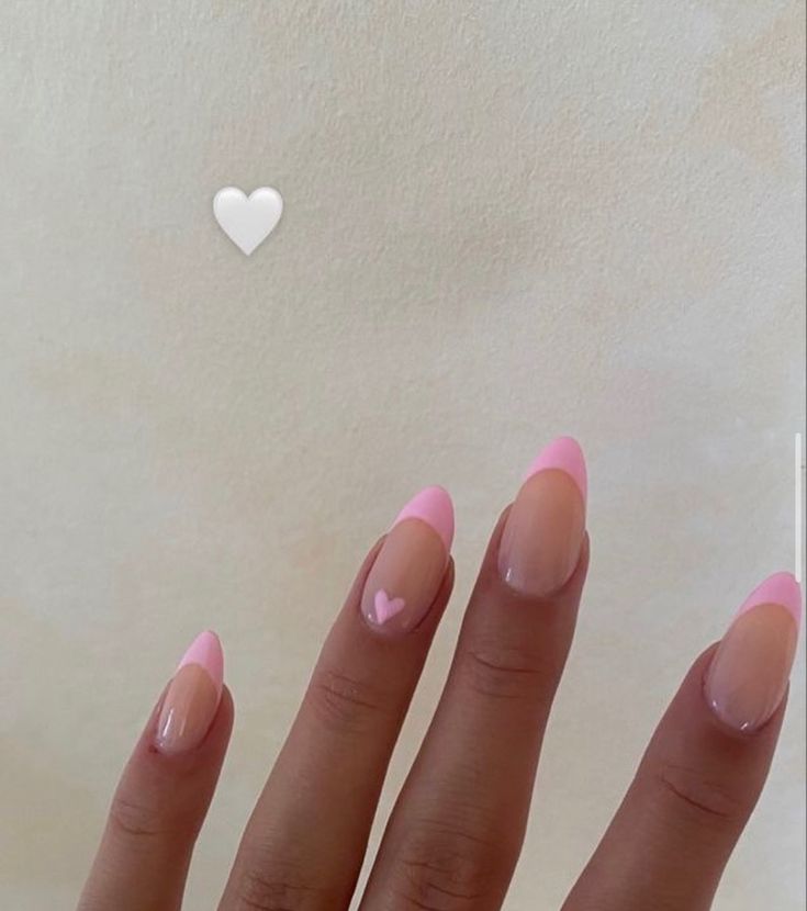 Charming Feminine Nail Design with Soft Ombre, Pink French Tip, and Heart Accent