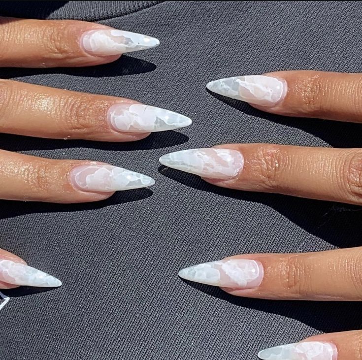 Chic Almond-Shaped Nails with Ethereal White and Translucent Design.