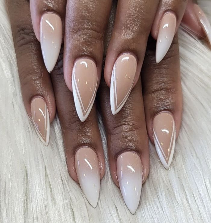 Chic Ombre Stiletto Nails with Triangular Tips for a Modern Touch.