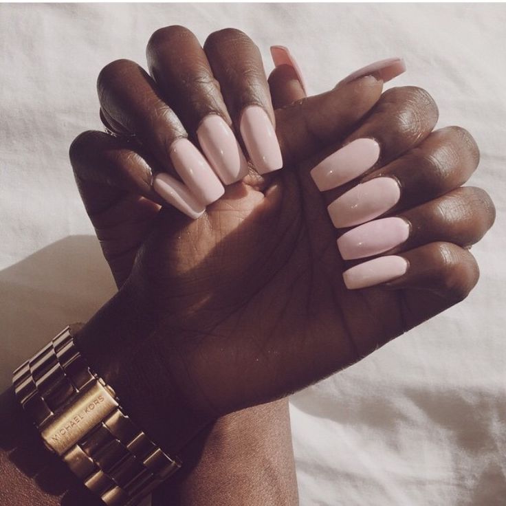 Chic Almond-Shaped Nails in Pastel Pink with Glossy-Matte Finish, Paired with a Stylish Gold Watch.