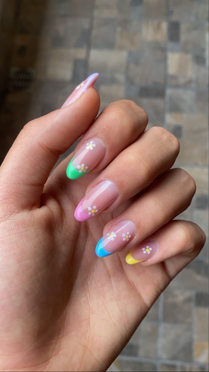 Playful Colorful French Tips with Whimsical Floral Accents for Spring/Summer.